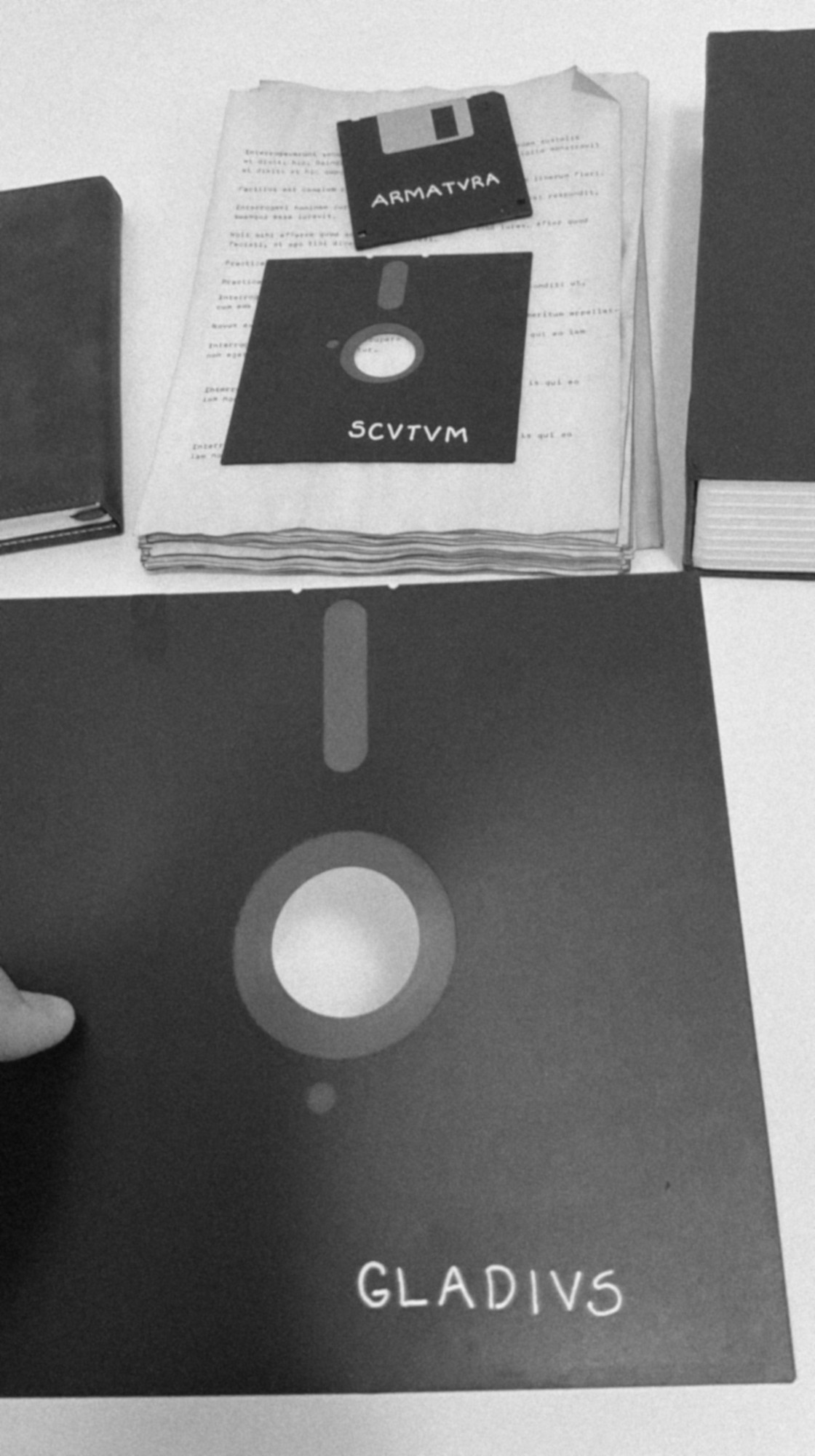Vintage disks labeled ARMATVRA, SCVTVM, and GLADIVS
